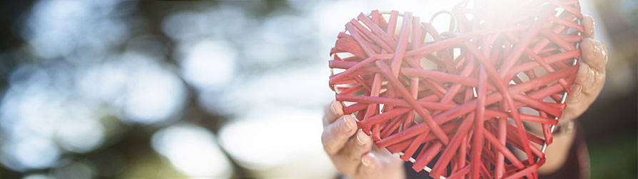 Wicker Heart Shape held up with hands